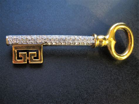 givenchy golden key pin brooch new york 1977|Vintage Signed Givenchy 1977 Gold Tone Skeleton Key Brooch Pin.